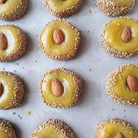 9:Arrange on tray, glaze, and add almond topping