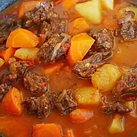 5:Add potatoes and carrots, continue slow cooking