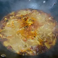 5:Add water and bring to a boil; add tofu skin if using