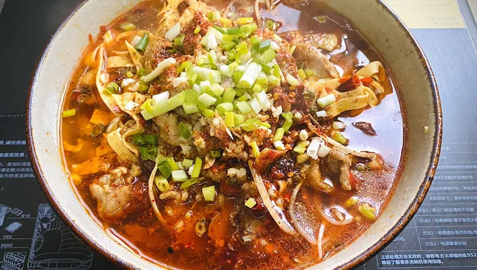 Sichuan-Style Boiled Pork with Spicy Sauce Recipe (水煮肉片)